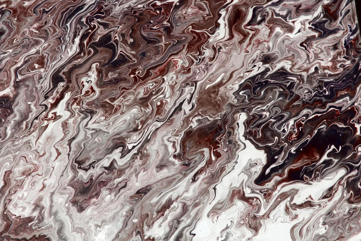 Bunte abstrakte Marmortextur mit Wirbelmustern und Erdtönen