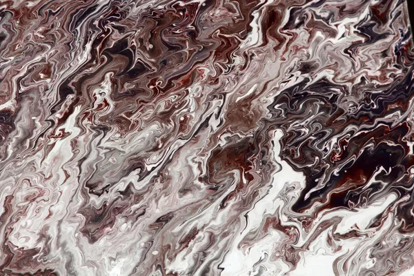 Tessitura marmo astratta colorata con motivi vorticosi e toni terrosi.