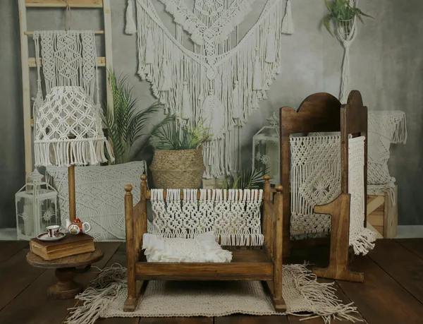 Intricately crafted macrame decorations in a cozy, natural-themed interior setting.