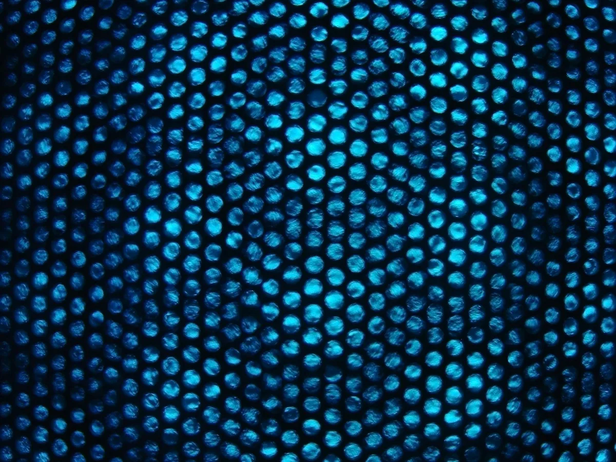 Lebendige abstrakte Textur mit blauen Punkten als einzigartiges Muster – ideal für Hintergründe