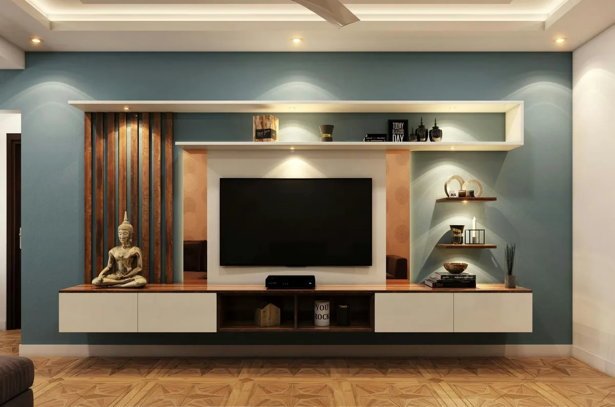 Soggiorno minimalista elegante con TV, mensole decorative e statua Buddha