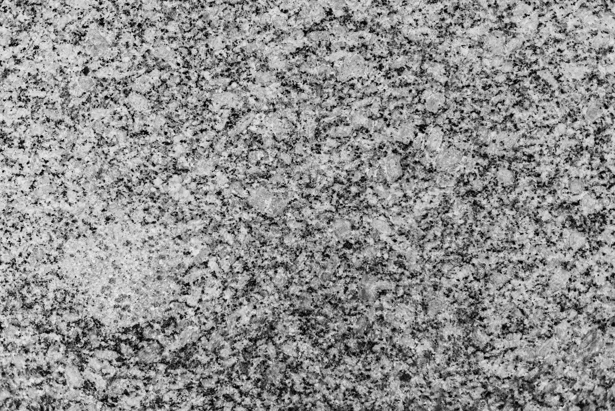 Texture di granito in bianco e nero con alto contrasto e grana fine