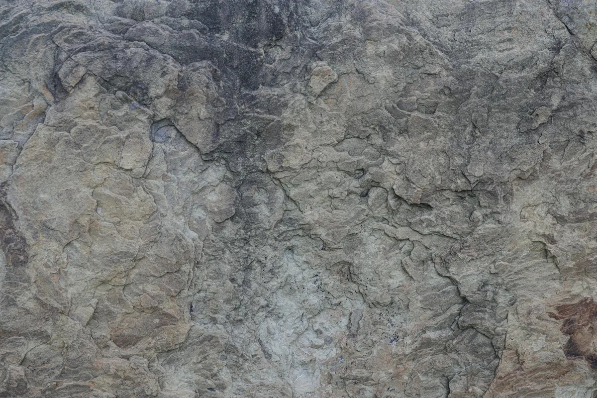 Superficie in pietra grezza, texture per sfondi e design