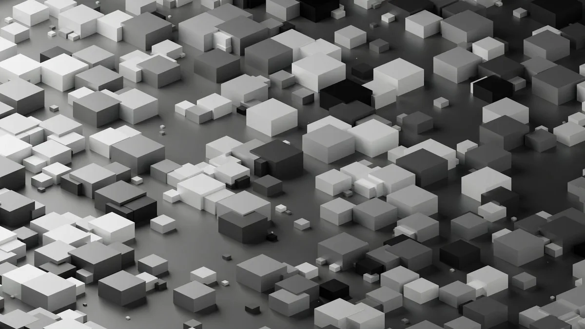 Immagine astratta in scala di grigi con cubi geometrici in un pattern ripetuto per concept di design